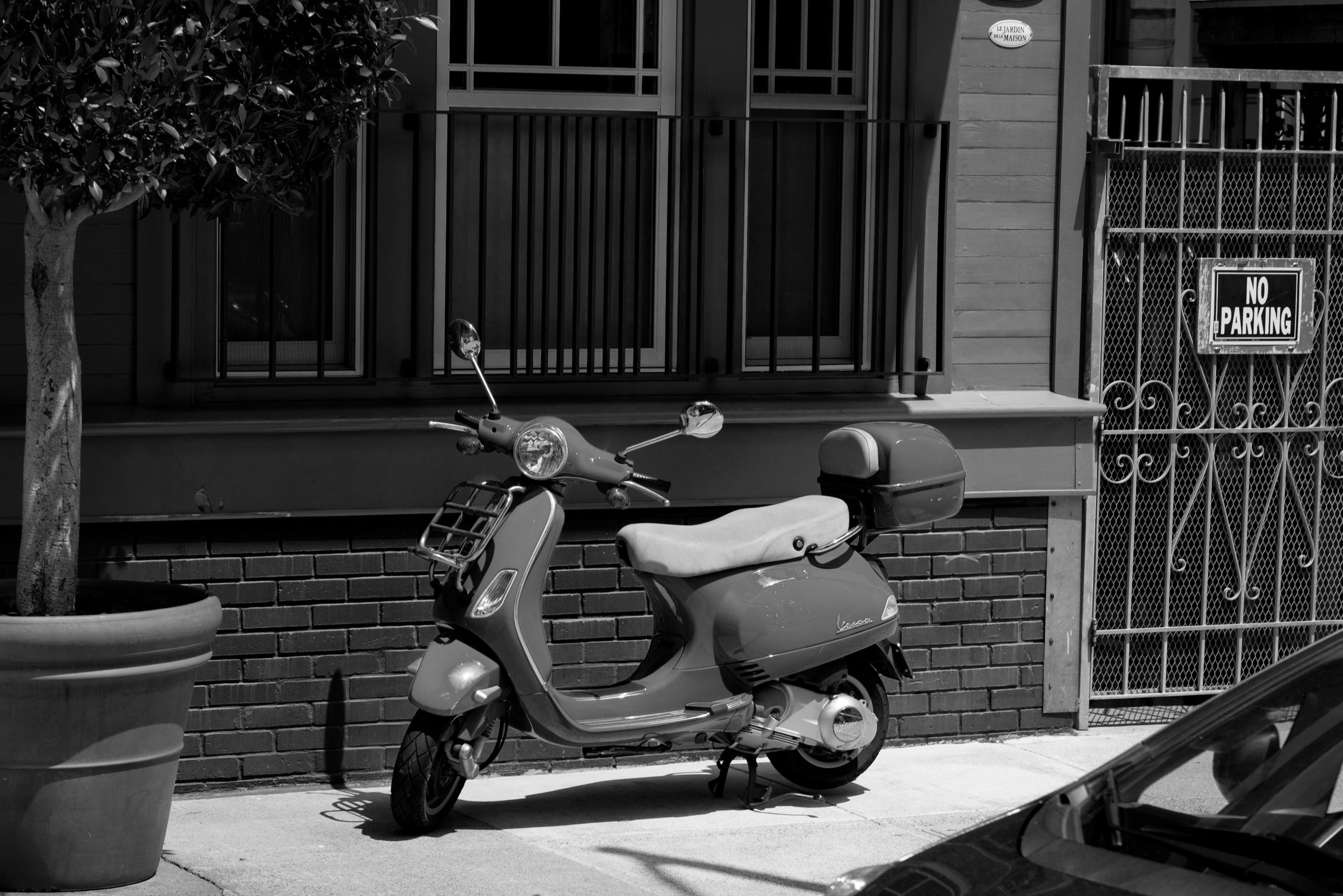Scooter on the Sidewalk
